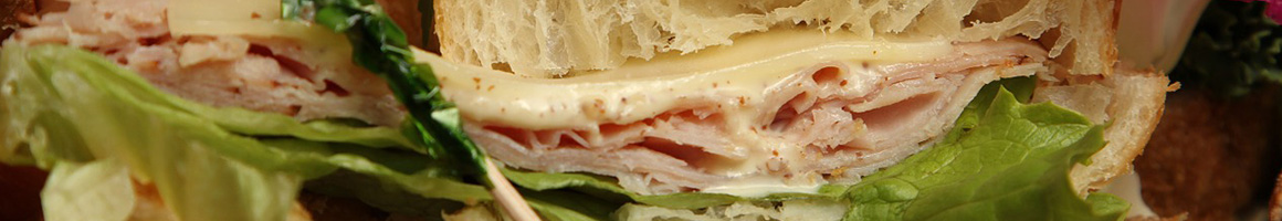 Eating Italian Pizza Sandwich at Enzo's Pizzeria restaurant in Lynn, MA.